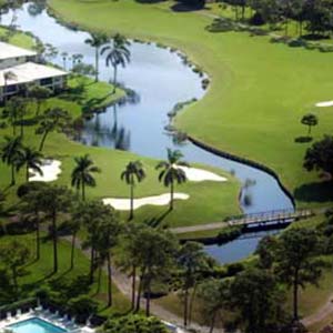 Quail Ridge Country Club - Boynton Beach, Florida - Fully-completed and 100% owned by its members, this private gated south Florida country club features two championship golf courses designed by famed architect Joe Lee. Aside from an active golf program, residents can enjoy a fully staffed tennis center, a state-of-the-art fitness center and a myriad of social clubs and activities. A low-density community offering stately homes, handsome villas and garden apartments, all neatly placed along the magnificent golf courses and refreshing lakes. Condos priced from the high $100,000's; Villas priced from $400,000; Custom homes available.