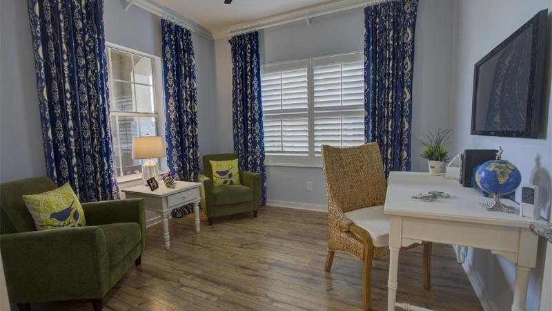 The Daniela plan features a den in addition to two bedrooms, perfect for a home office.