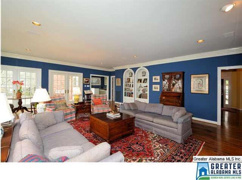Large living room with great views and built-ins.