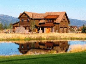 View of back of home from golf course