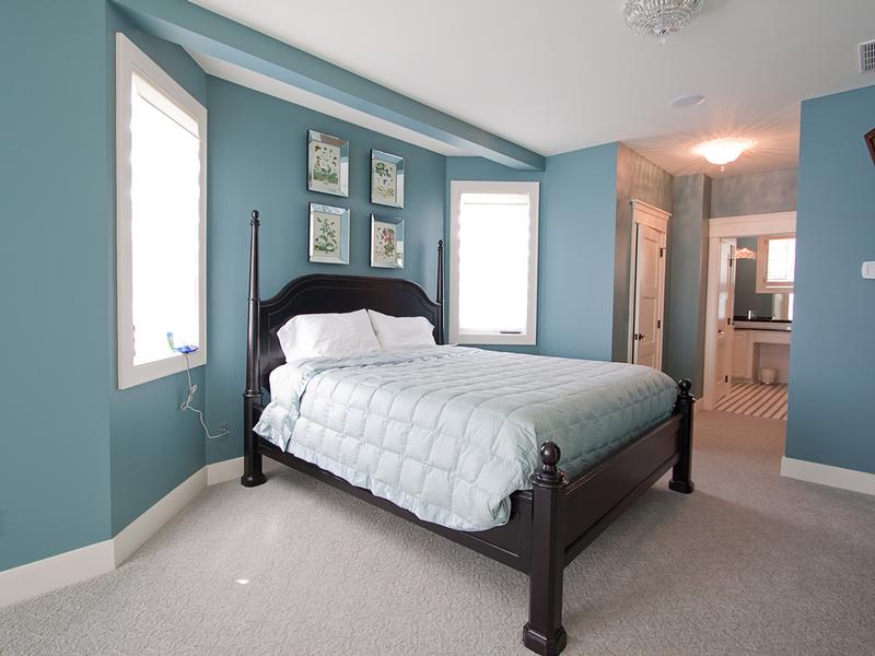 Master suite with expansive views to golf course