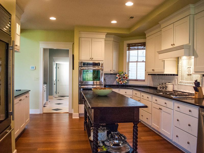 Open kitchen with gourmet appliances and granite finishes