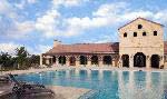 A view of the resort style swimming pool and pool house at Vintage Oaks at the Vineyard