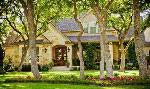 View of a custom home within Vintage Oaks at the Vineyard