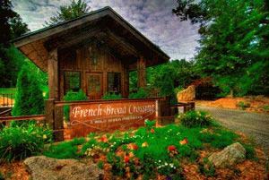French Broad Crossing - Asheville, North Carolina - French Broad Crossing is a private mountain community 30 minutes from the arts center of Asheville, North Carolina and near historic Hot Springs.  Spread across 750 acres of woods, community residents enjoy a view across the French Broad River to a protected 200-acre ridge.  With only 150 total homesites the community remains natural and exclusive. Homesites priced from the low $100,000's; Homes priced from the high $400,000's.