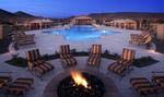 Members of Blackstone enjoy relaxing evenings around the fire pit at the resort pool.