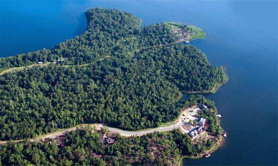 Legacy Point on Lake Tuscaloosa - Tuscaloosa, Alabama - The first private gated community on Lake Tuscaloosa, Legacy Point spans 55 acres of lakefront property with numerous recreational amenities including picnic pavilions, community piers, dedicated boat slips for homeowners, and 3,300 feet of common area lake frontage for residents to enjoy. Only 11 miles from downtown Tuscaloosa, Legacy Point is convenient to interstates and shopping, with easy access to Crimson Tide football and basketball at the nearby University of Alabama. Offering prime lakefront real estate, homesites range from $180,000 to $270,000; Craftsman-inspired cottage plans priced from $450,000 to $800,000.