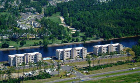 Lauderdale Bay - Myrtle Beach, South Carolina - Located directly on the Intracoastal Waterway in the heart of Myrtle Beach, South Carolina, Lauderdale Bay offers home buyers luxurious three and four bedroom condominiums each with its own private balcony affording spectacular views of the Intracoastal Waterway and the Arrowhead Golf Club. Amenities include a promenade for leisurely strolls along the Waterway, a private marina and boat slips, a swimming pool, elevators, and private covered parking and underground storage. Condos priced from $264,900 to $324,900.