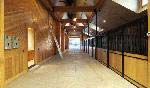 Estate #39 includes climate controlled indoor stables, kitchen, bathroom and tac room with direct access to the indoor riding arena.