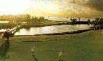 The 614-yard 14th hole at Sailfish Point typically plays into the wind, and the approach has to carry a large lake and bunker.