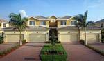River Strand Golf & Country Club includes multi-family coach homes with 2-car garages