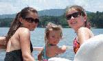 Enjoying a pontoon boat ride on the lake at Hot Springs Village