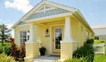 The affordably priced Rose Cottage features a welcoming front porch and rear entry garage.