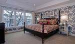The master bedrooms in the Stuart and Tyler home designs can be upgraded with tray ceilings, as shown in the Tyler model.