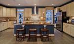 The main level of the Tyler model features a center-island kitchen with views of the dining and great room.