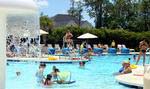 The Aquatics Center at Southbridge includes a waterslide, kid’s spray area, lap pool and poolside pavilion & snack bar.