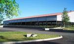View of the 125' x 225' covered arena at Equestrian Lakes with a 29-stall barn and private tack rooms.