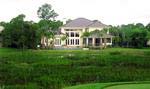 Large lots—more than half an acre—are the norm in this Palm Beach Gardens golf community.