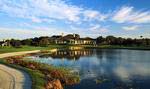 The Old Marsh clubhouse overlooks a 5-acre lake that divides the 9th and 18th holes.