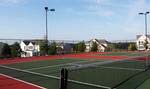 The championship tennis courts located at The Grove Clubhouse.