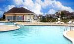 Bethany Bay includes a free-form pool and spa, plus a kiddie pool and bathhouse surrounded by an expansive deck.