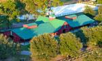 Spring Island’s Equestrian Center, complete with a 24 stall barn and a new 100x200 foot riding arena and 60’ round pen.