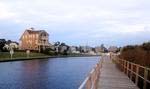 View of the boardwalk and marina at St. James Plantation