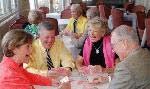 The 19th-Hole lounge at Indian River Colony Club where residents enjoy a drink, hors d'oeuvres, and friendship