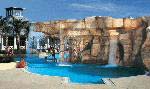 The Aquatic Club includes a lagoon-style pool with waterfall, a 32-foot winding water slide, competition and volleyball pools.