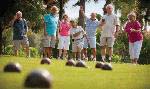 Residents enjoy an outside game of bocce ball at the Osprey Club.