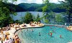 The lakefront infinity edge pool overlooks Bear Creek Lake at Bear Lake Reserve