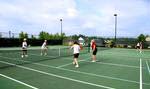 Residents enjoy tennis and pickelball on four hard courts.