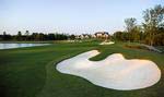 View of the back of clubhouse from the Greg Norman Signature Golf Course at Savannah Quarters