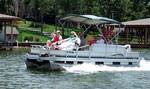 Enjoying a pontoon boat ride on the lake.