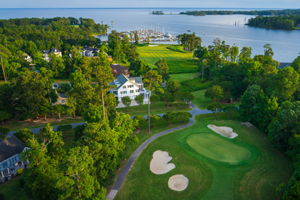 A Dan Maples signature golf course and a 166-slip deepwater marina highlight this gated waterfront community in the Albemarle Sound region of northeastern North Carolina.