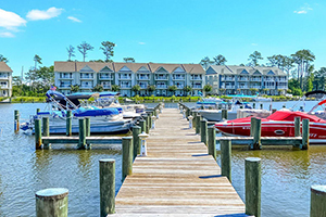 Coastal community in Berlin, Maryland, with two championship golf courses, a 96-slip marina, fitness center, tennis courts and an extensive nature preserve. See photos and get info on homes for sale.